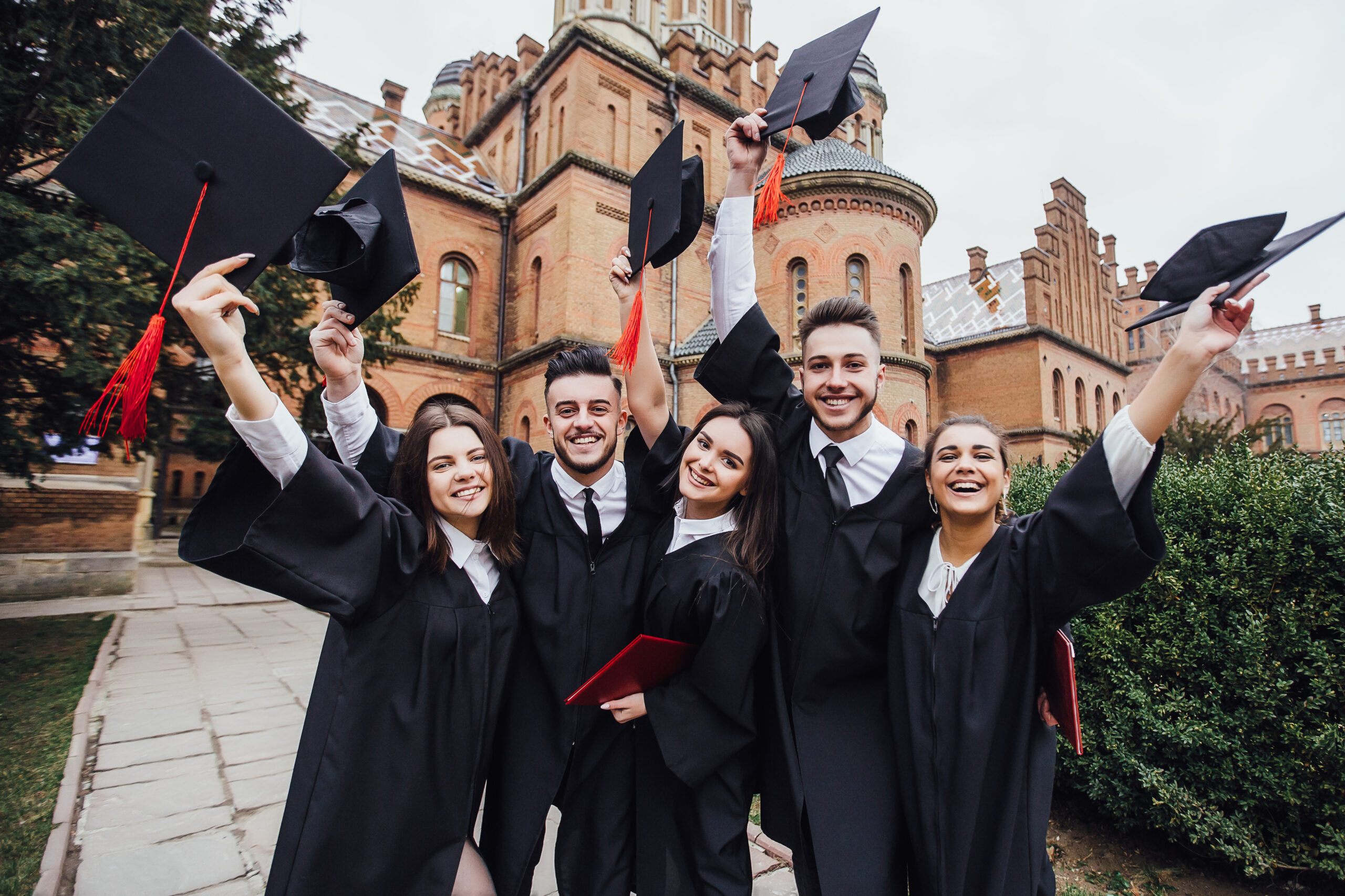 Students.university.  People wearing mantles. Group of Students!